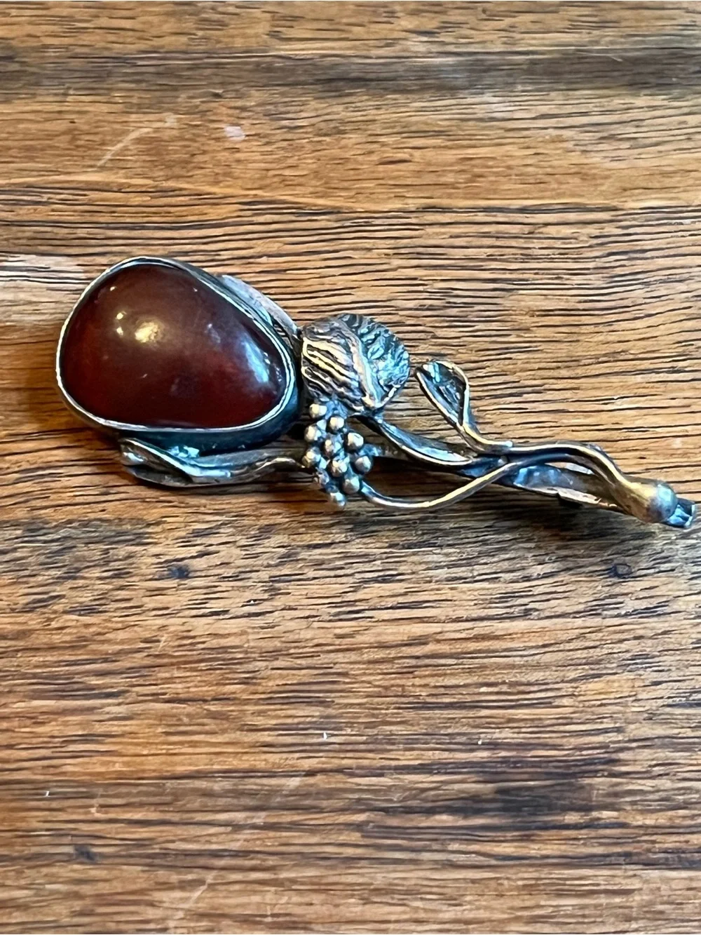 Handcrafted Sterling Silver Flower Brooch with Deep Red Amber Cabochon Stone